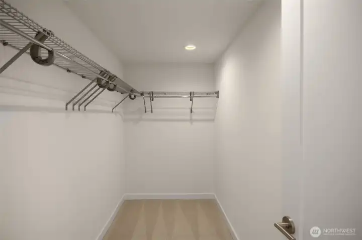 Primary walk-in closet.