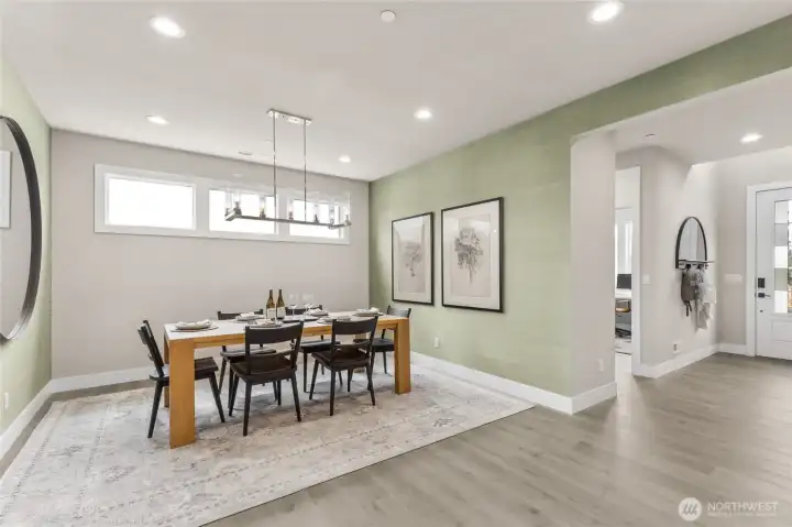 Another great view of the dining room. Photo is representational. Actual home is under construction and materials, colors, and finishes will vary. See site agent for details.