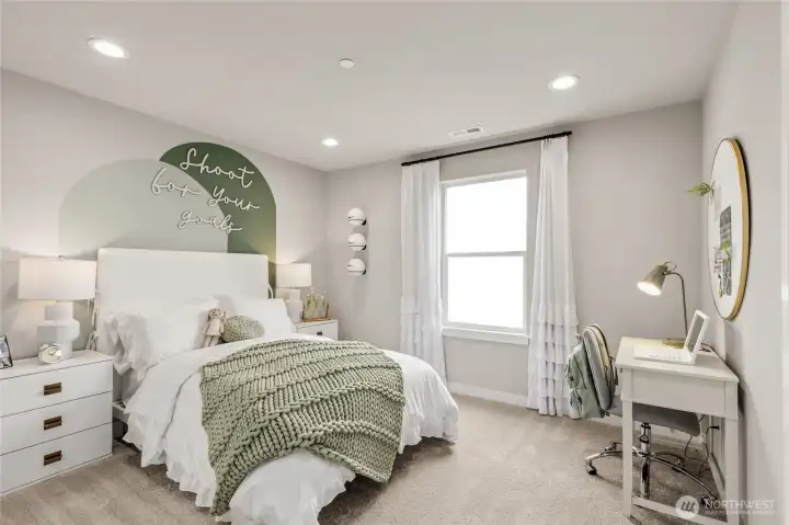 Upper level, Secondary bedroom with walk-in closet. Photo is representational. Actual home is under construction and materials, colors, and finishes will vary. See site agent for details.