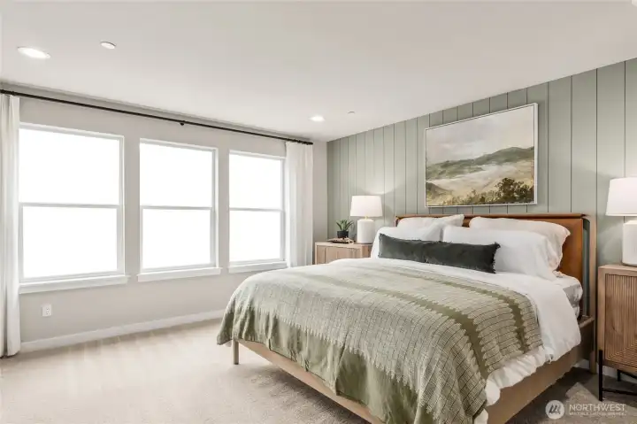 Anther view of the primary bedroom. Photo is representational. Actual home is under construction and materials, colors, and finishes will vary. See site agent for details.