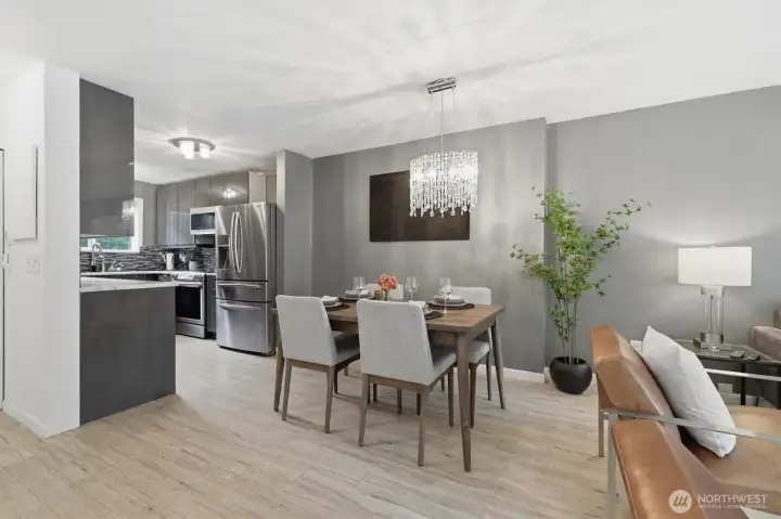 The dining space leads to the kitchen