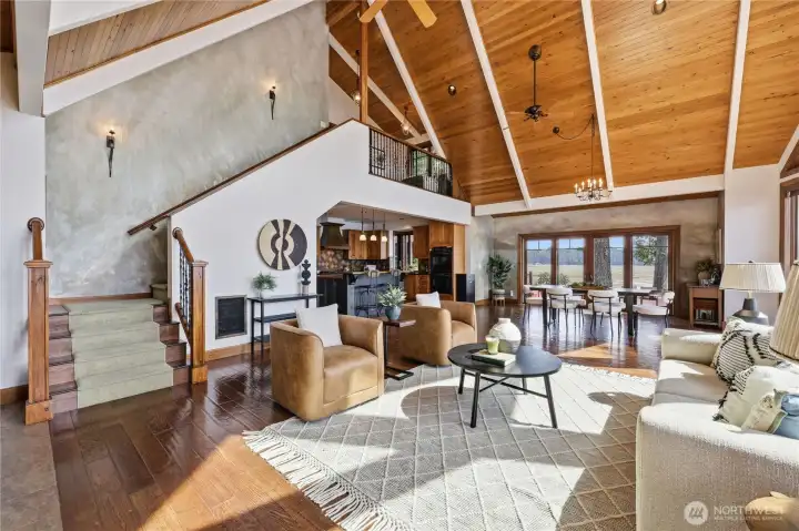 The staircase opens to the entire main living area below. The view only get better on the way up!