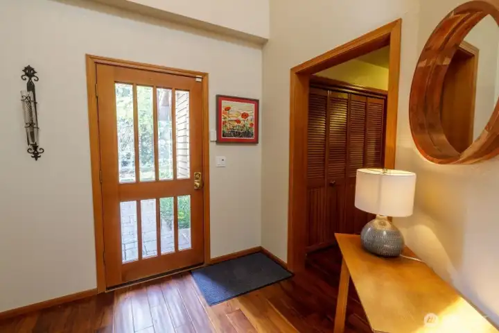 Enter onto the Engineered hardwood flooring into this beautiful, well-planned, and updated rambler with lots of wood accents and vaulted ceilings.