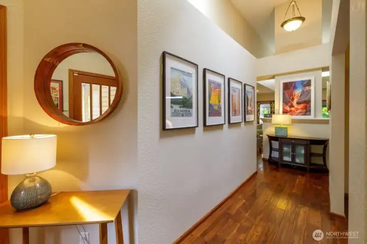 Entryway with bedroom wing on the left, garage on the right, or straight ahead into the living space.