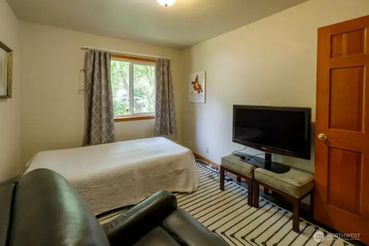 Second bedroom overlooks the front yard and features large closet.