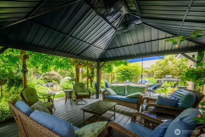 Trex deck features sunshade on portion, right outside the living room.