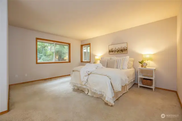 Master bedroom is over-sized, with room for a king-size bed and sitting area.