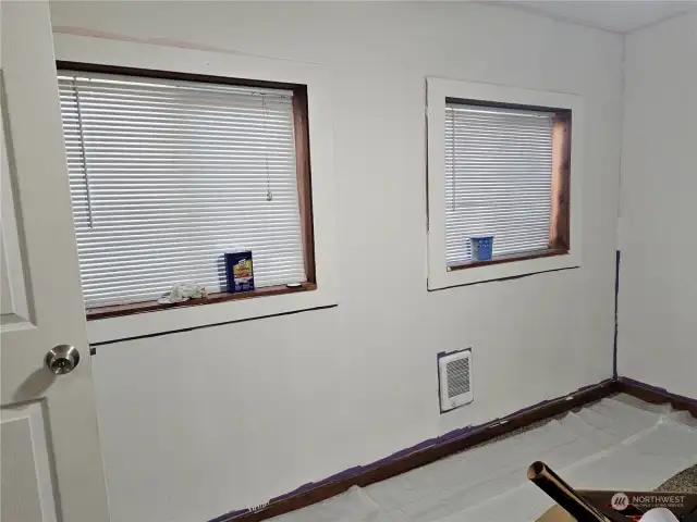 Large windows in Master Suite have a view of the large fenced in back yard.