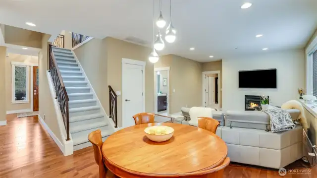 Light & bright family room & breakfast nook off kitchen with gas fireplace for relaxing.  Newer top of the line carpet & new interior paint.