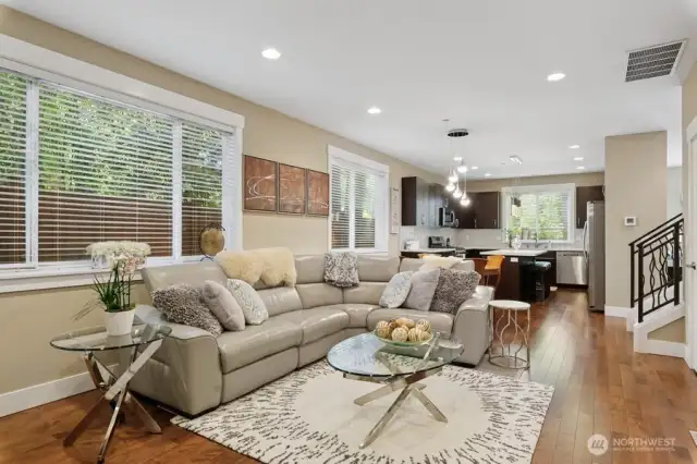 Open & inviting floor plan with large windows is spacious for entertaining, yet comfortable just enjoying a fire and relaxing.