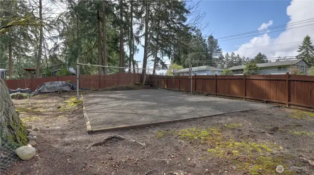This stunning property features a spacious and inviting yard perfect for outdoor enthusiasts. Enjoy your very own sand volleyball court, ideal for entertaining guests or staying active.