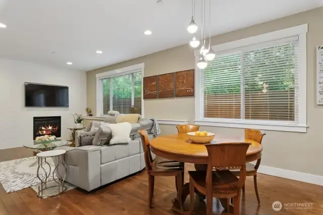 Main floor family room with gas fireplace, hardwood floors off the kitchen.