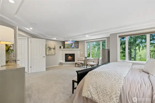 Spacious Upper level Master Suite with seating area & Marble surround fireplace