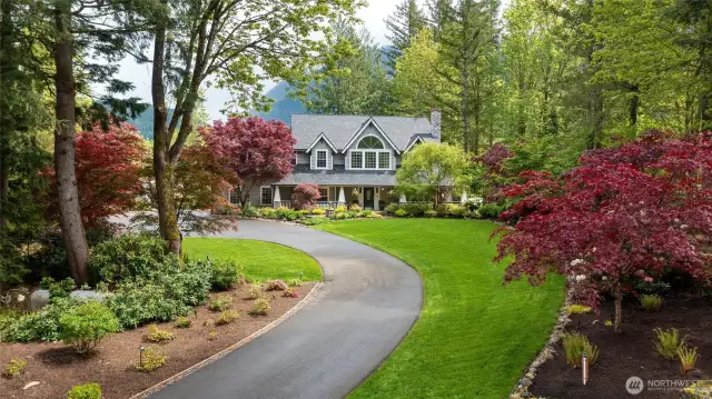 Nestled down a long drive flanked by lush landscaping & Sited on just over 2 acres private seclusion, this immaculate Pacific Northwest Home awaits