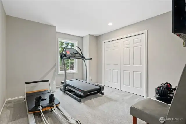 Currently used as a work out room, this 2nd spacious Bedroom awaits