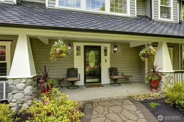 Covered entry way continues around the side. 50 Year old presentation Roof installed 2 years ago.