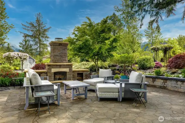 Another View of the Wood Burning Fireplace and seating area are quietly nestled with the sounds of the waterfall in the background ( previously shown)