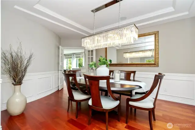 Formal Dinning Room with coffered ceiling and wainscoting detail