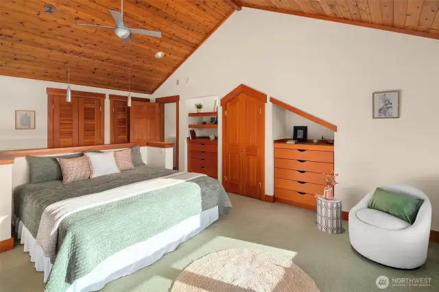 Built in bed, vaulted warm wood ceilings, custom built-in dressers and Juliet balcony overlooking the living room and private outdoor balcony to take in the views, reflect and relax.
