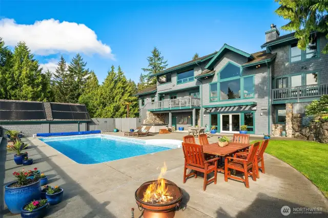A terrific spot to lounge, dine, entertain guests or even take a nap on the lawn between dips in the pool.