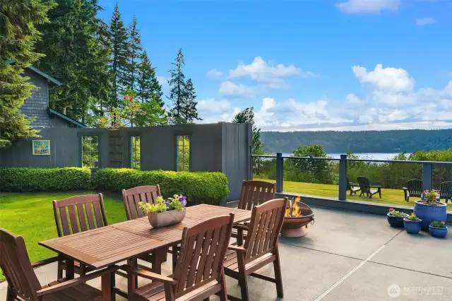 Lovely views from the patio, too. Building on the left is the one-car garage with studio above.