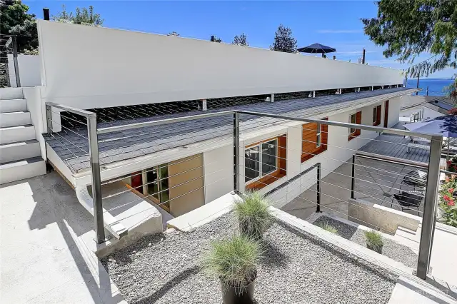 Looking at the side of the house on the way up to the rooftop deck