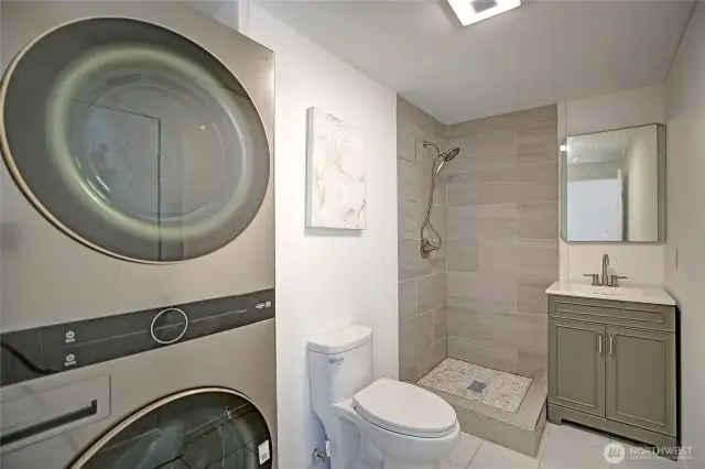 guest bath, with washer dryer tower. Glass shower door has been installed!