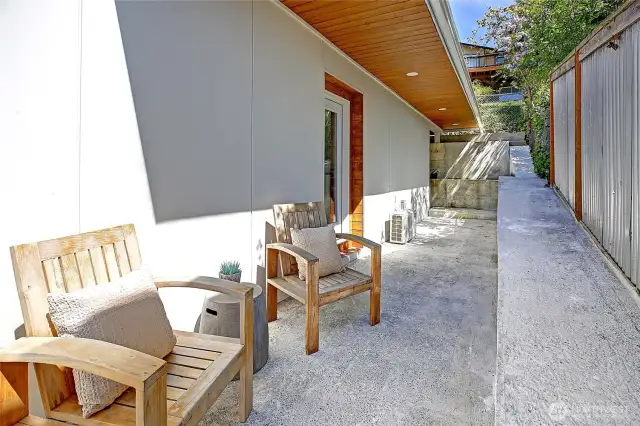 opposite side of house, with plenty of usable space