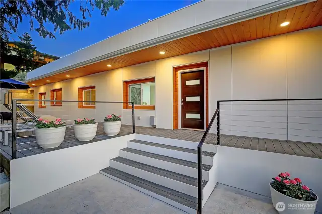 twilight view of home, lots of exterior lighting