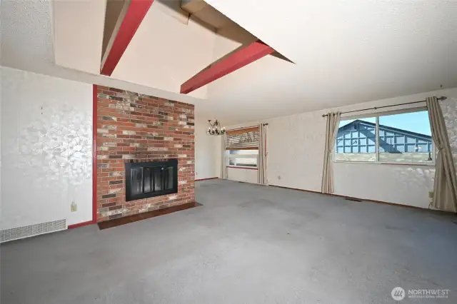 Wood burning fireplace and dining room