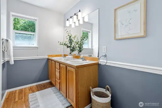Bath off primary with dual vanity and full bath.