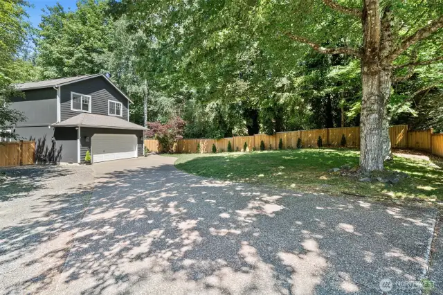A generous driveway and 2-car garage provide plenty of parking.