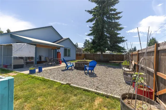 Covered patio leads to firepit