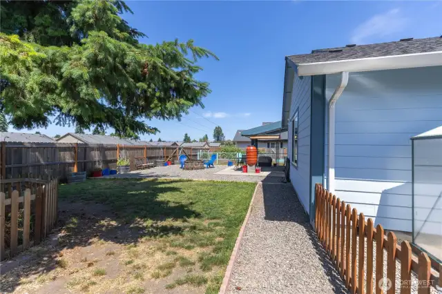 Large backyard looks out to open space