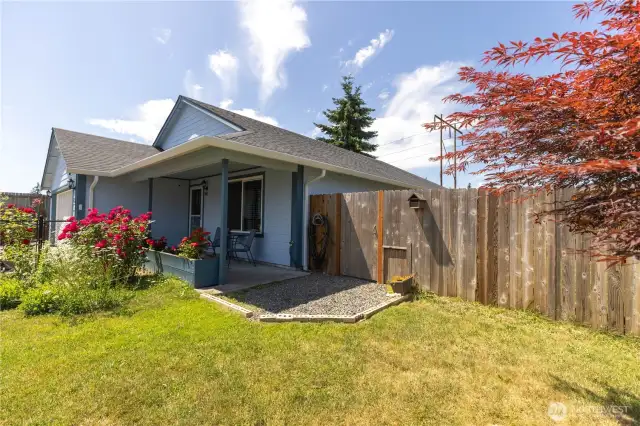 Covered front porch and large yard