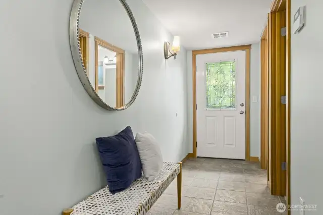 Your entry has room for a bench or shoe storage.