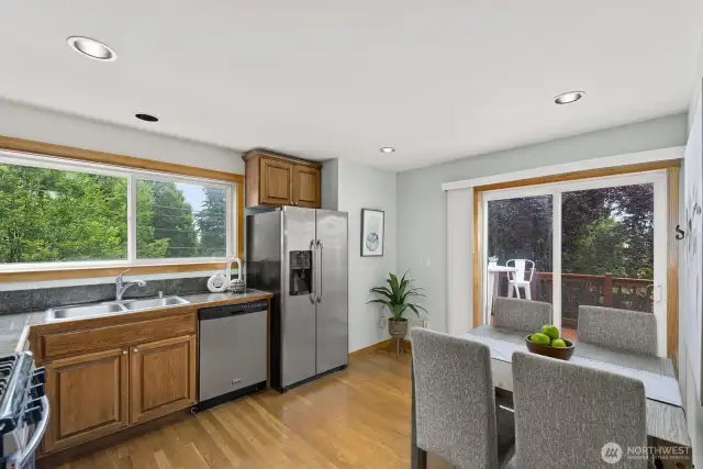 Your kitchen has stainless appliances and room for a table.