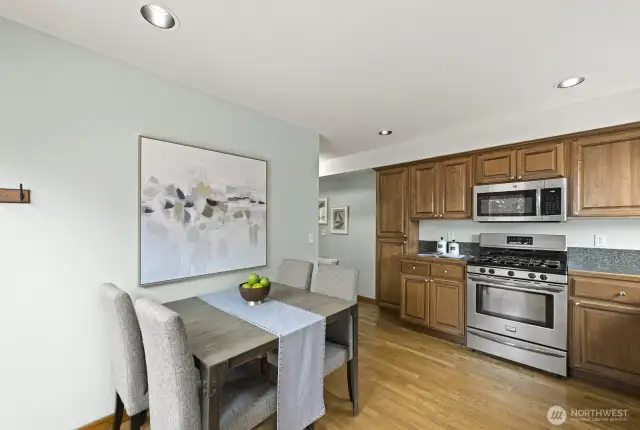 Pantry cabinet on the far left.