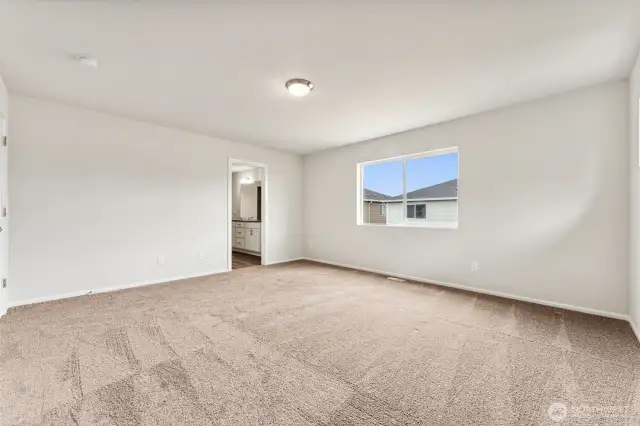 Primary Bedroom-Disclaimer- Photos are from a similar floor plan from another community, photos are for illustrative purposes only. Finishes, flooring, features, upgrades, countertops, paint, colors, and other features may vary.