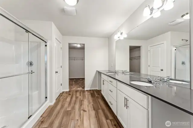 Primary Bath-Disclaimer- Photos are from a similar floor plan from another community, photos are for illustrative purposes only. Finishes, flooring, features, upgrades, countertops, paint, colors, and other features may vary.