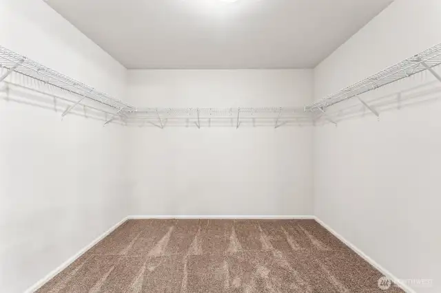 Primary WIC-Disclaimer- Photos are from a similar floor plan from another community, photos are for illustrative purposes only. Finishes, flooring, features, upgrades, countertops, paint, colors, and other features may vary.
