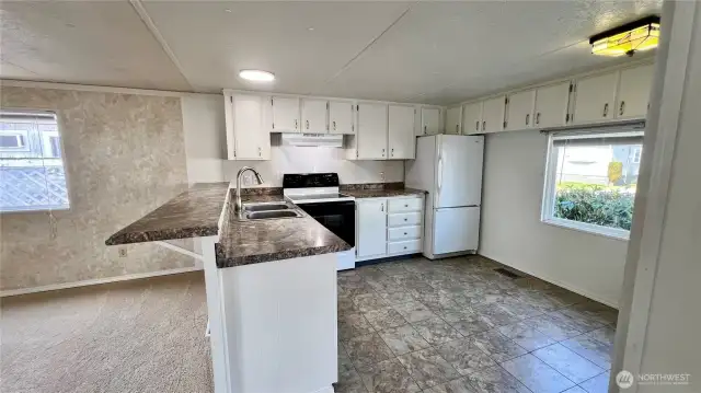 Large open kitchen with bar