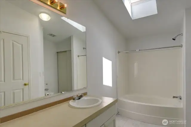Primary bath with skylight.