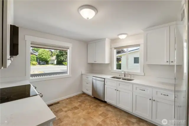Flush mount sink and full-height cabinetry