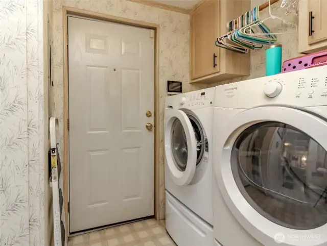 Back door leading to  Carport &  Dryer & Washer aren't included with the sale
