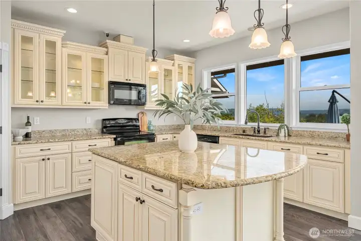 Chef's kitchen with large center island.