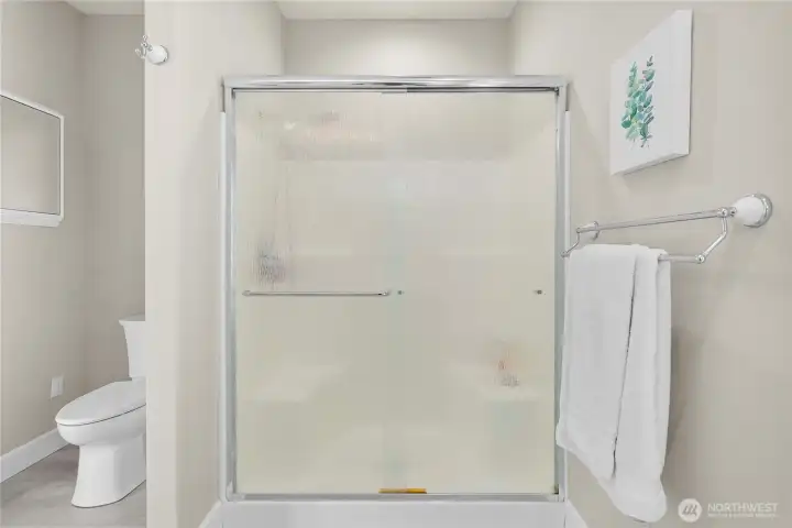 Primary Bathroom with step in shower.