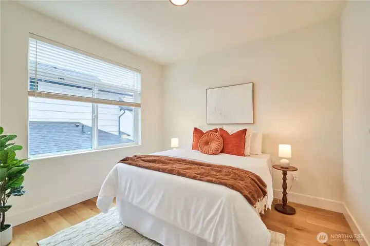 There's also a spacious bedroom on the main level with ample closet space.