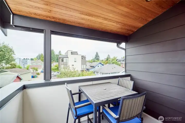 Adjacent to the primary bedroom is a covered deck with territorial views.