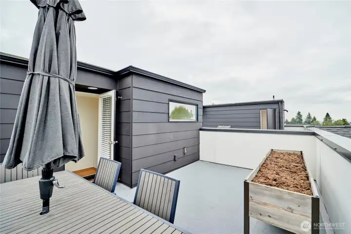 The home also features a spacious roof deck with views to the north and the west. it conveniently offers a hose bib, electrical outlet, storage closet and a natural gas quick connect for a heater or BBQ grill. The raised planter box can stay if the buyer wants it.